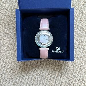 Swarovski pink wrist watch, band new, never worn, has receipt